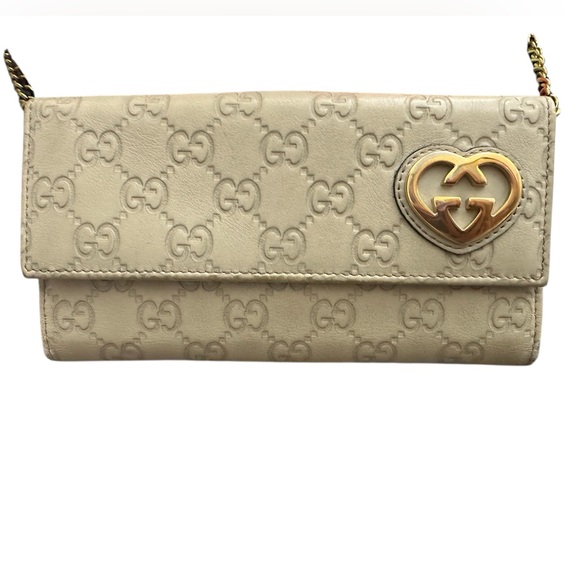 Gucci Handbags - Gucci Cream Embossed GG Leather Wallet with Gold Heart Logo